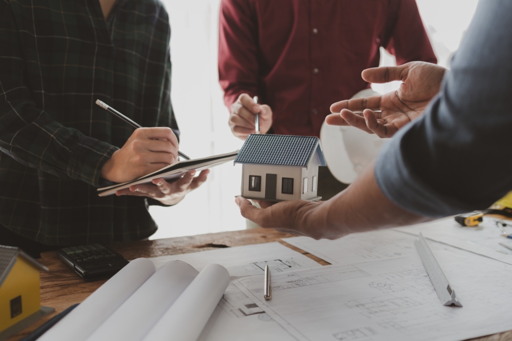 Architects and engineers work together to come up with solutions to house building problems, The pro